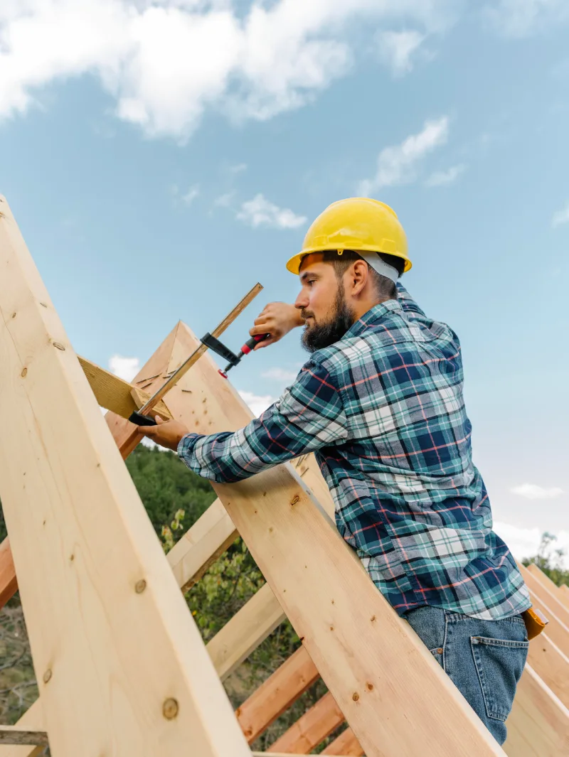 worker-with-hard-hat-building-roof-house worker-with-hard-hat-building-roof-house